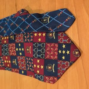 Retro multi pattern stars and horse bit Tommy Hilfiger red, blue, and green tie